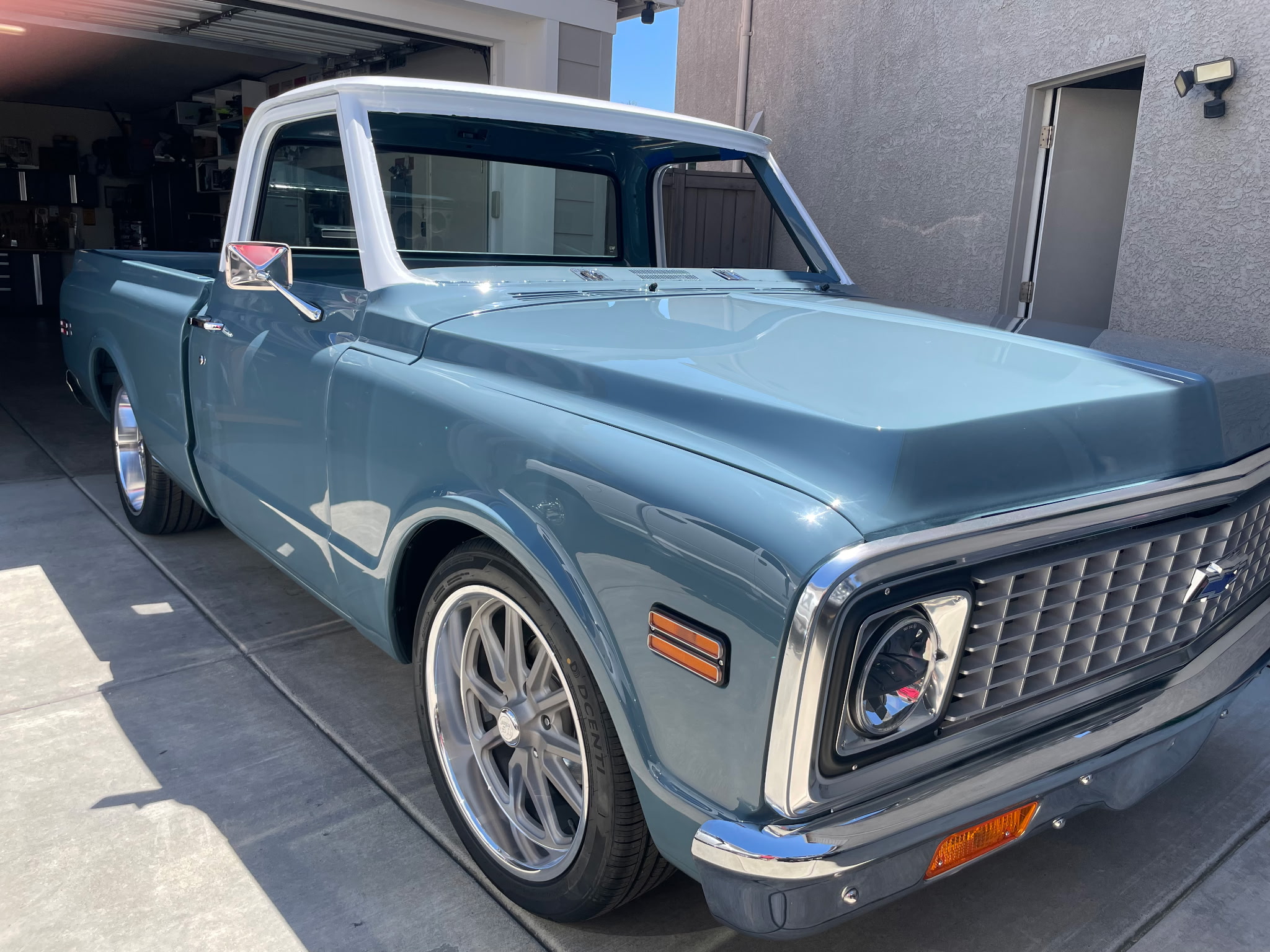 Restored light blue Chevy C-10 short bed truck